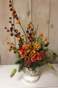 $40. WK-406.   Fall arrangement in textured pedestal pot