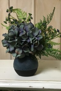 $30.  WK-479.  Denim blue ceramic bud vase with Hydrangea and fennel flowers